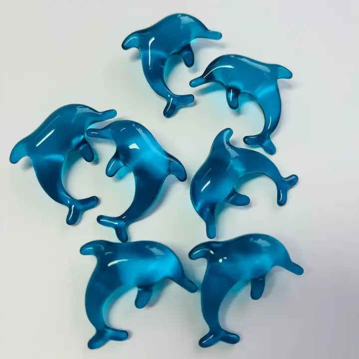 Perles de bain parfumées à l'océan, en forme de dauphin