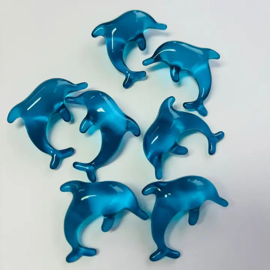 Perles de bain parfumées à l'océan, en forme de dauphin
